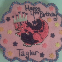 Tayler's 4Th Bday Cake Dinosaur cupcake cake....basic yellow cake with buttercream icing...fondant flowers...fondant tiara