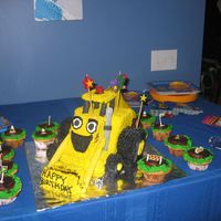 My Nephew's 3Rd Birthday Cake...scoop From Bob The Builder I had a lot of help from other cake central members with this one. I followed their advise and gave Scoop three tiers of chocolate pound...