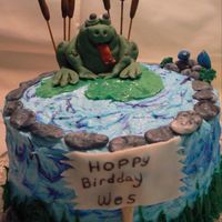 Frog In Pond Apple Spice cake with apple cinnamon BC icing. Frog, cattails, birds, rocks are Fondant/gumpaste, the lily pad is white chocolate fondant....