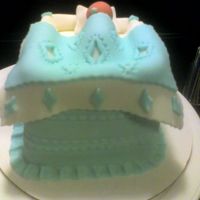 Bouncing Baby Boy Bed Made this cake as a "Bringing Baby Home" present for my neighbors. It's a mini cake w/ fondant decorations