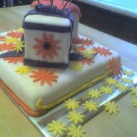 Present Cake 2 small cakes on 1 sheet cake all decorations in fondant