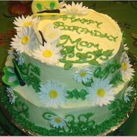 Daisies And Butterflies 2 This was my first time doing fondant butterflies and daisies. I still have a lot of practicing to do. I made this cake for my Grandma'...