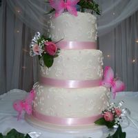 Scrolls & Butterflies Three tier fondant with fresh flowers, silk butterflies.