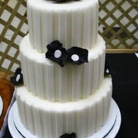 Black Posies This is one of my display cakes made for a recent wedding show. I copied the design from a cake I saw on the Knot because I just loved it....