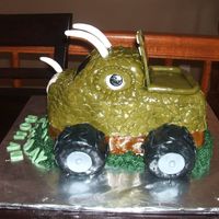 Monster Truck This cake was made with 2 loaf pans and one square cupcake for the top. One layer is chocolate and one layer is vanilla with a buttercream...