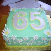 Daisy 65Th Birthday Cake Cake for a friend. Her mother was turning 65 so only instructions were a big 65 on top and square. 10" square, chocolate and yellow...