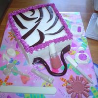 Purse Manicure Cake Cake for my daughter's 10th birthday party. They went for their first manicures. Buttercream with fondant and chocolate accessories.