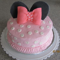 Minnie Mouse Birthday Celebration This was a cake for my daughter's 5th birthday. She wanted a minnie mouse theme. It is BC w/fondant accents.