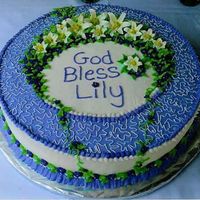 Lily's Christening Cake A french vanilla 16" cake filled with strawberry filling. Iced with buttercream. Lily's and drop flowers were made using royal...