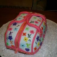 Lv Pocketbook my mom made this for my birthday, love to shop and pocketbooks are a weakness