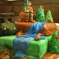 Huntin' Groom Bride wanted her hubby in camo with his shotgun and his Yamaha Rhoni ATV. Gave me pictures of both...a lot of fun to make! Three tiers,...