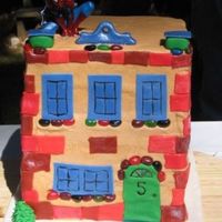 Spiderman Building So this cake was for a Spiderman birthday party for a 5 year old...The party was all superhero and so they wanted an understated spiderman...