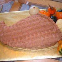 Cornucopia I sculpted the cornucopia shape using a pattern. Iced in a buttercream basketweave.