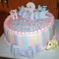 My Little Pony 10" buttercream cake with fondant decorations. Little ponies were also madeof fondant.