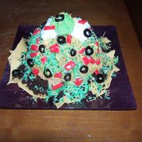 Taco Salad Cake The chocolate cake was baked in a Wilton wonder mold pan. The top was cut off and crumbled to place around the edges for ground beef. The...