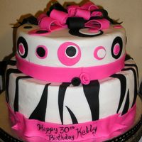 Go Wild When Your 30! White Choc Raspberry cake and BC with fondant accents.