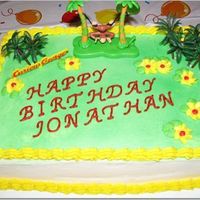 Curious George Birthday Cake My first cake done for my son's birthday. Buttercream frosting.