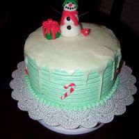 Mint Chocolate Snow Chocolate cake with creme de menthe buttercream, fondant snowman and characters. "Snow" is thinned buttercream with crystal...