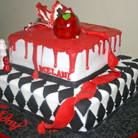 Twlight this was made for a Twlight lover . chocolate with chocolate buttercream covered with fondant and pearls. the chess pieces and apple and...