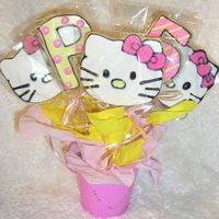 Hello Kitty Cookie Bouquet These were for a 5th birthday. Thanks to Carmie00 for the Hello Kitty idea!NFSC with my variation of Alice's Cookie Icing. For some...