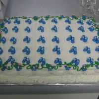 Garrett's Cake #3 First time to make baby booties---tooo much fun!!! It worked out well!