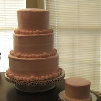 Ella's Cake Before Decorations This is for a 1 year old party. WASC, naturally. Buttercream w/MMF accents. This is before decorating, see my pictures for after....