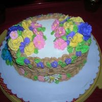 Wilton Cake Course 2-Final Cake I loved this cake so much, it was a butter pecan cake with maple bc frosting. My brother loved it so much that he wanted to shalack it so...