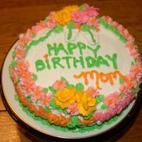 Mom's Bday Cake This cake drove me nuts. I tend to over do and I swore I wouldn't on this cake and well, I did anyway. I ended up adding some slivered...