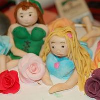 Jnme.jpg I made these girls after reading the article her on how to make a fondant fairy. It really helped alot. It is supposed to be a friend of...