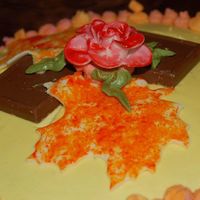 Painted Fondant Rose Up close of the fondant rose, I was trying to tip it in red around the petals but ended up making it look water colored.