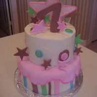 Elizabeth's Birthday Cake My daughter looked at pictures and designed this for her 7th birthday party. It was the premier of HSM2, so she wanted stars and glitter!