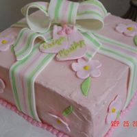 Painted Ribbon Cake This was my first attempt at painting the fondant ribbons. Worked well that time, but have had trouble since. The customer loved it!