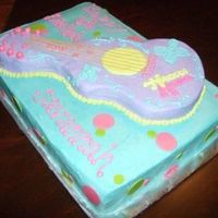 Hannah Montana Guitar I was in a huge hurry when I did this cake and put the guitar the wrong way..oops! but you get the idea of what it was supposed to be! It...