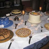 Dessert Party 2007 The "slice-it" table from our annual dessert party last night. Clockwise from lower left:Snickers Cheesecake, Coconut-Cream Fudge...