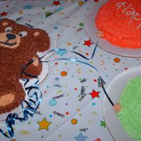 Baby's First Birthday this is the finished product of all three cakes. I attached a curling ribbon to the round cakes to make them look more like balloons with a...