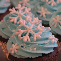 Snowflake Cupcakes Snowflake cupcakes. Buttercream frosting. Hand-piped royal icing snowflakes.