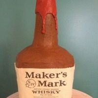 Makers Mark All buttercream. I got it to stand by using a papertowel holder as the support.I used a real label due to the time crunch of throwing a...