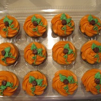 Pumpkin Cupcakes These cupcakes were inspired by "realms". I used Tootsie Rolls for the stems. The kids loved them.