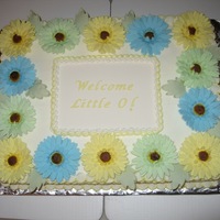 Gerber Baby Shower Cake This is a cake that I made for a baby shower. The couple is expecting a girl, but the mom-to-be doesn't like pink so they asked me to...