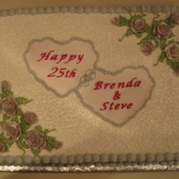 25Th Anniversary This is an anniversary cake I did for a co-worker's 25th wedding anniversary. This is my first time at doing cornelli lace. The roses...