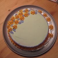 Img_0372.jpg Here is my Wilton Course 1 final cake. I think it looks alot better than the one I made at home. Thanks for looking! :)