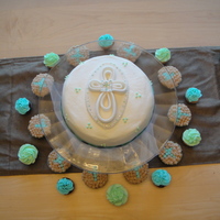 Boy Baptism Cake is marble with raspberry filling and buttercream with fondant cross. Cupcakes are pumpkin pie with pumpkin cream cheese frosting!...