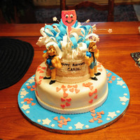 Modified "full Monty" Birthday Cake! For my friend's 60th birthday! Cake was chocolate red velvet covered in buttercream and then in fondant. Dancing men, ribbons and wine...