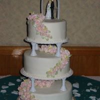Cake1.jpg This was my first wedding cake which I made for my husband's brother. It is a butter cake and the filling was buttercream with fresh...