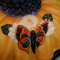 Flowers And Butterflies Cake So simple cake. White cake baked in a wilton flower pan, vanilla crumb coat then covered with marshmallow fondant. The little flowers are...