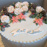 Let It Snow . . . Winter Holiday Cake This is a two-layer cake, frosted in very pale, ice-blue, bakery BC. All of the decorations on the top are BC except for the white banner (...