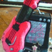 Guitar And Amp I made this for my daughter's 8th. I used pound cake because I needed somthing firm for the guitar. Mostly buttercream with fondant...