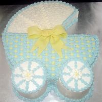 Baby Boy Stroller My first stroller!14" pan with 4 " wheels. Wasc with buttercream and fondant/gumpaste bow. TFL