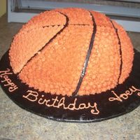Basketball Cake Whipped icing (star tip) with fondant stripes.