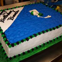 Swimmer's Birthday Cake Buttercream frosting with a fondant swimmer doing the back stroke.